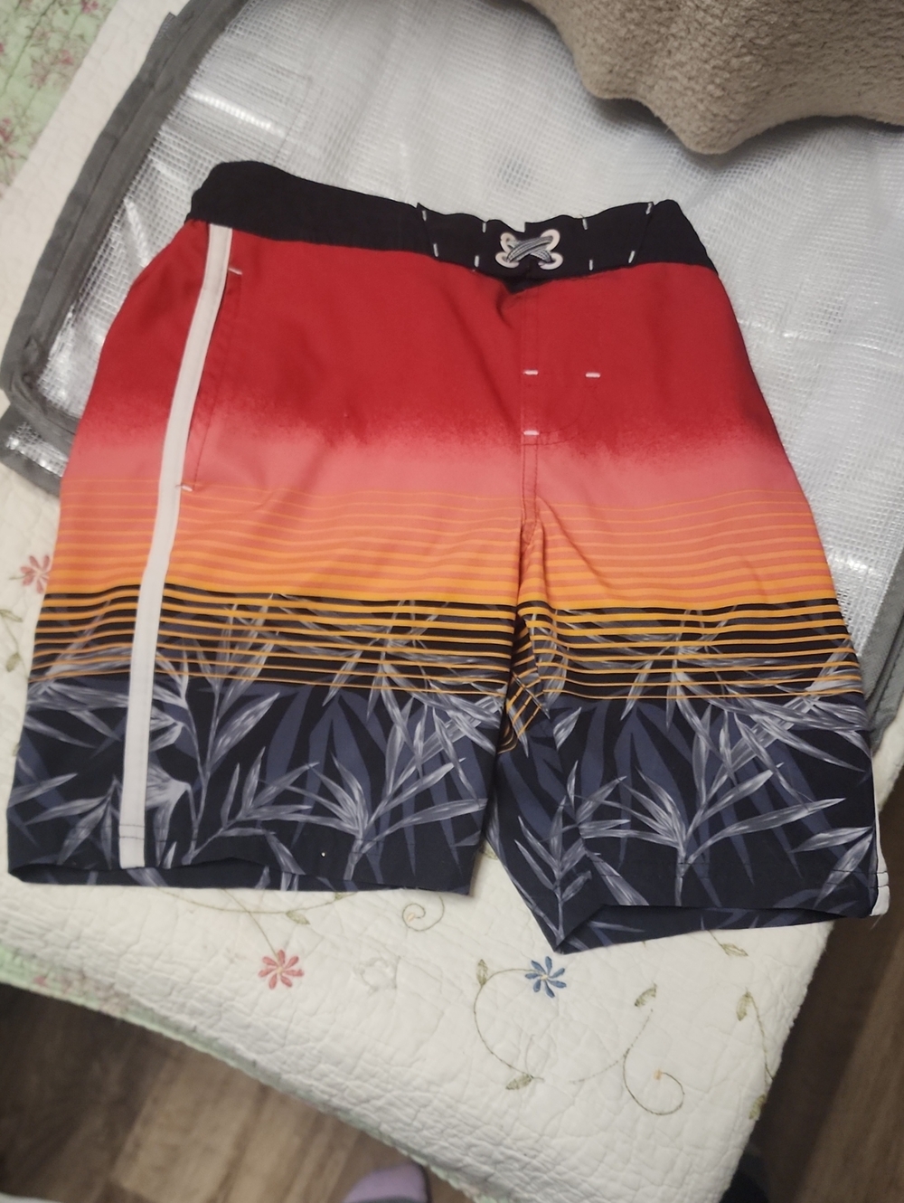 Boy's Red-to-Orange Gradient Swim Board Shorts with Navy Leaf Print